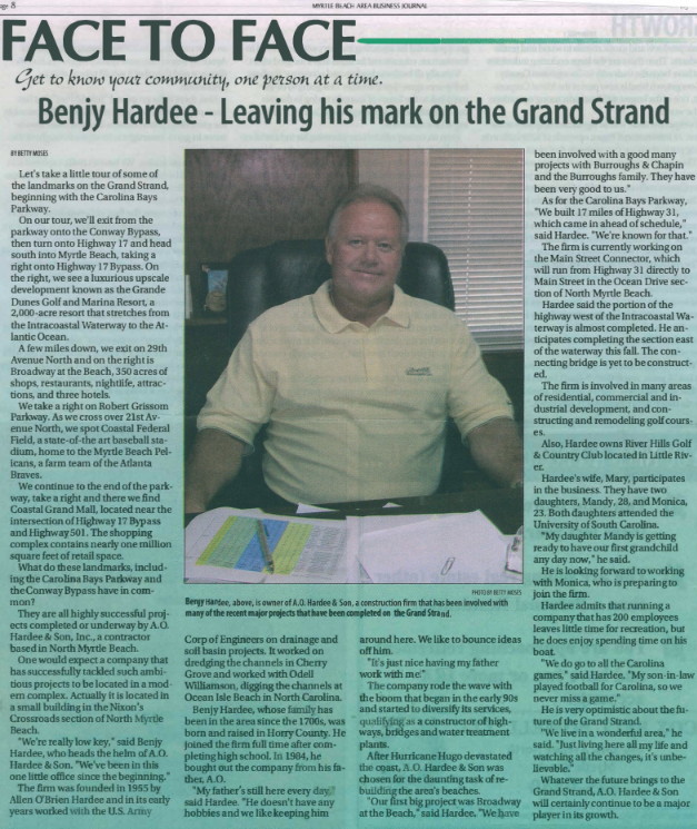 Benjy Hardee sits at his desk.